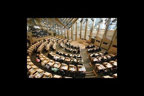 Camera-friendly lighting took precedence over energy efficiency in the debating chamber, with two metal halide spotlights trained on each MSP